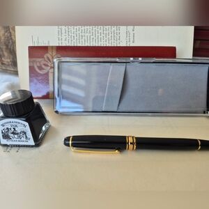 Elegant Black Fountain Pen with Gold Accents